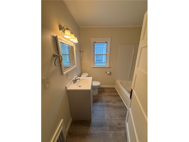 Located in the Maplewood Historic District! Add this duplex to - photo 24