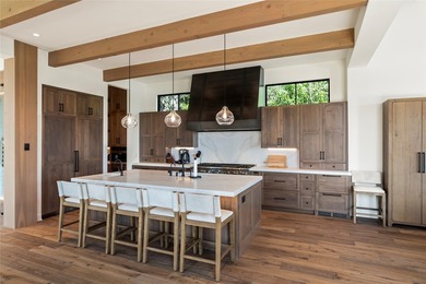 Peak Lakeside Luxury! Built by Malmquist Construction, this - photo 24