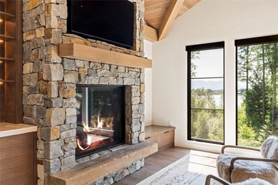 Peak Lakeside Luxury! Built by Malmquist Construction, this - photo 36