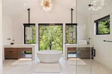 Peak Lakeside Luxury! Built by Malmquist Construction, this - photo 38