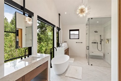 Peak Lakeside Luxury! Built by Malmquist Construction, this - photo 39