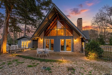 LOCATION, CHARM, AND FULL GUEST HOUSE. Nestled at the end of a