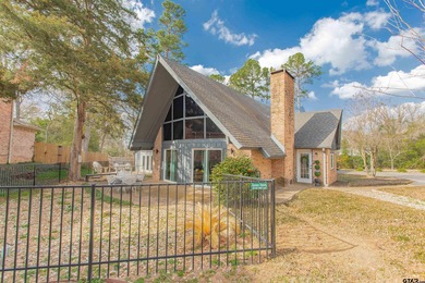 LOCATION, CHARM, AND FULL GUEST HOUSE. Nestled at the end of a