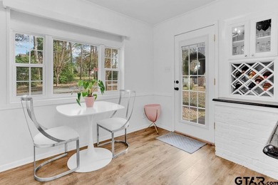 LOCATION, CHARM, AND FULL GUEST HOUSE. Nestled at the end of a