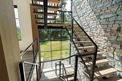 Peak Lakeside Luxury! Built by Malmquist Construction, this - photo 46