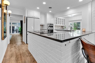 LOCATION, CHARM, AND FULL GUEST HOUSE. Nestled at the end of a