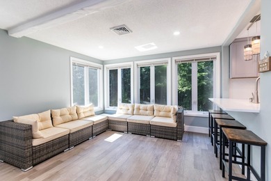 Renovated 2023 4 bedrooms/2 bath raised ranch with deed beach - photo 3