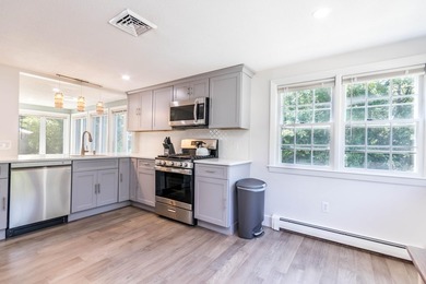 Renovated 2023 4 bedrooms/2 bath raised ranch with deed beach - photo 6
