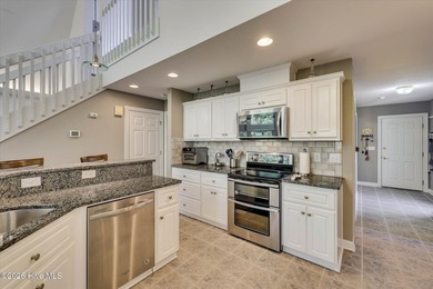 Lakefront living doesn't get better than this. Nestled on the - photo 2