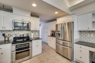 Lakefront living doesn't get better than this. Nestled on the - photo 3