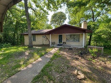 3 bed, 2 bath home offering 1,696 sq ft in Gun Barrel City - photo 1