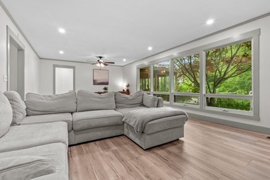 A quiet ranch wrapped in mature trees, soft natural light, and a - photo 15