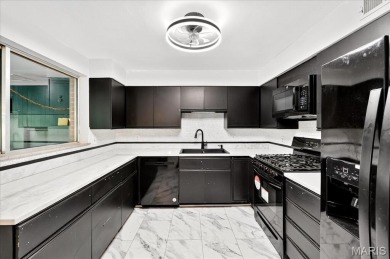 Beautiful all-brick home in St. Louis County featuring a rare