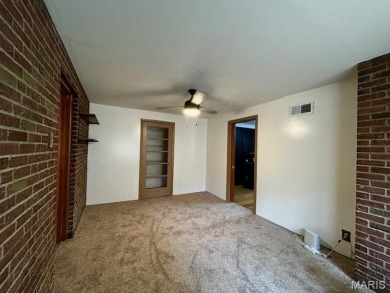Beautiful all-brick home in St. Louis County featuring a rare