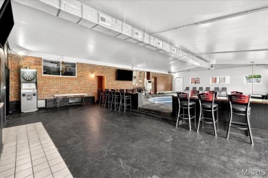 Beautiful all-brick home in St. Louis County featuring a rare