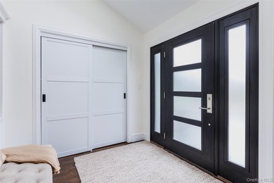 Tucked away on a lush, private three-quarter acre in the highly - photo 5