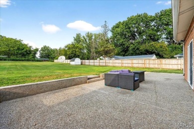 Beautiful all-brick home in St. Louis County featuring a rare