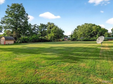 Beautiful all-brick home in St. Louis County featuring a rare