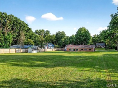 Beautiful all-brick home in St. Louis County featuring a rare