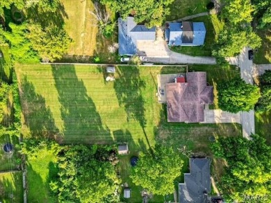 Beautiful all-brick home in St. Louis County featuring a rare