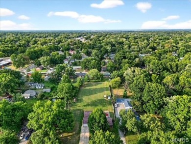 Beautiful all-brick home in St. Louis County featuring a rare