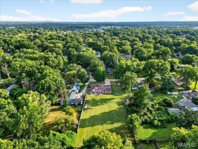 Beautiful all-brick home in St. Louis County featuring a rare