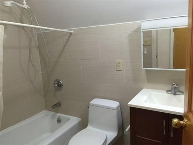 Semi-Detached All Brick 2-Family House located in sought-after - photo 9