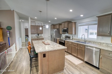 Built in 2023, this well-maintained Cavco home is situated on a - photo 14