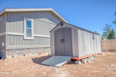 Built in 2023, this well-maintained Cavco home is situated on a - photo 18
