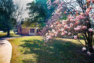 Lakefront classic! Brick ranch style home is ready for