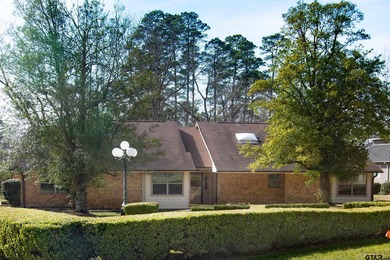 Lakefront classic! Brick ranch style home is ready for