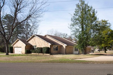 Lakefront classic! Brick ranch style home is ready for