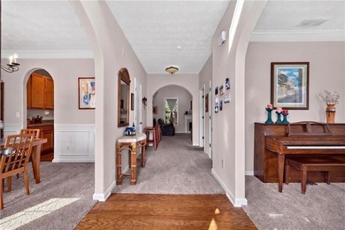 Tucked away on a private wooded homesite, this beautifully - photo 3