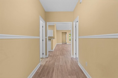 NEWLY REFRESHED & MOVE-IN READY! Discover this inviting - photo 3