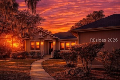 Enjoy amazing sunsets from almost every room of this marsh front - photo 1