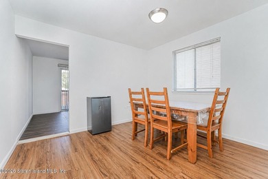 Welcome to this well-maintained single-family semi-attached home - photo 6
