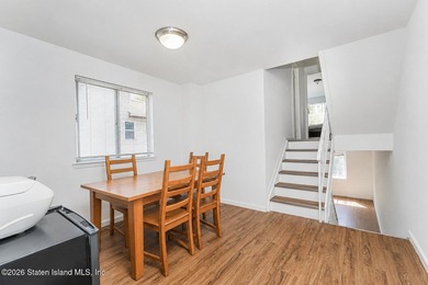 Welcome to this well-maintained single-family semi-attached home - photo 8
