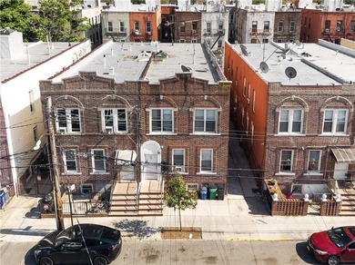 The subject property is a fully renovated brick semi-detached - photo 1