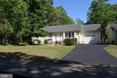 Nestled in the serene community of Captain's Cove, this is a - photo 1