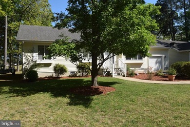 Nestled in the serene community of Captain's Cove, this is a - photo 2