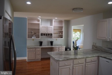 Nestled in the serene community of Captain's Cove, this is a - photo 8