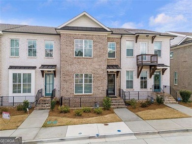 Welcome to this beautifully upgraded three-level townhouse - photo 1