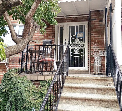 Beautifully updated two-family home in the Morris Park section - photo 2