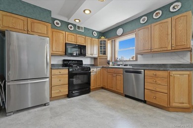 Well maintained three bedroom 1.5 bath triplex home with central - photo 9