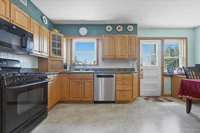 Well maintained three bedroom 1.5 bath triplex home with central - photo 10