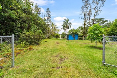 Tropical flexibility meets island charm on this fully fenced - photo 23