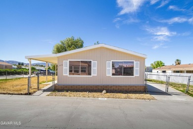 Beautifully remodeled 4 bedroom, 2 bathroom mobile home located - photo 1