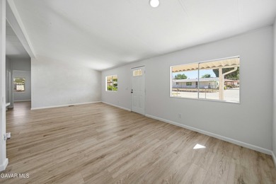 Beautifully remodeled 4 bedroom, 2 bathroom mobile home located - photo 3