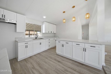 Beautifully remodeled 4 bedroom, 2 bathroom mobile home located - photo 7