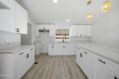 Beautifully remodeled 4 bedroom, 2 bathroom mobile home located - photo 8